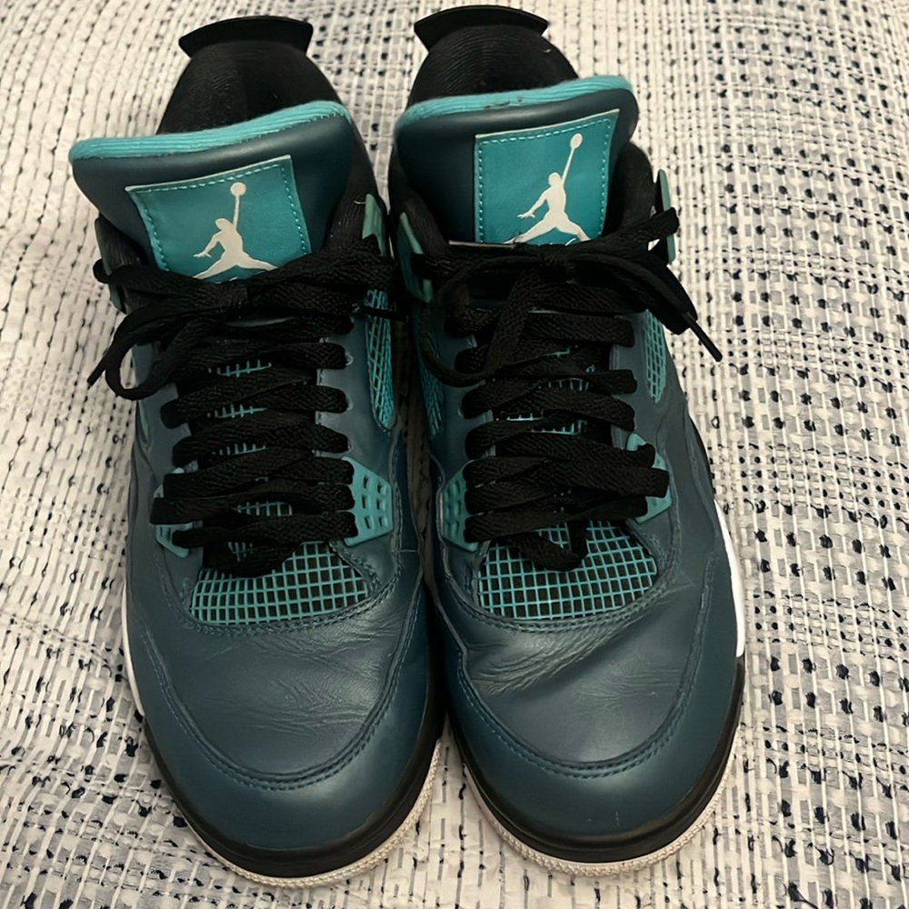 Air Jordan 4 Size 10.5 Teal in Color Used and missing foot pads in each shoe.
